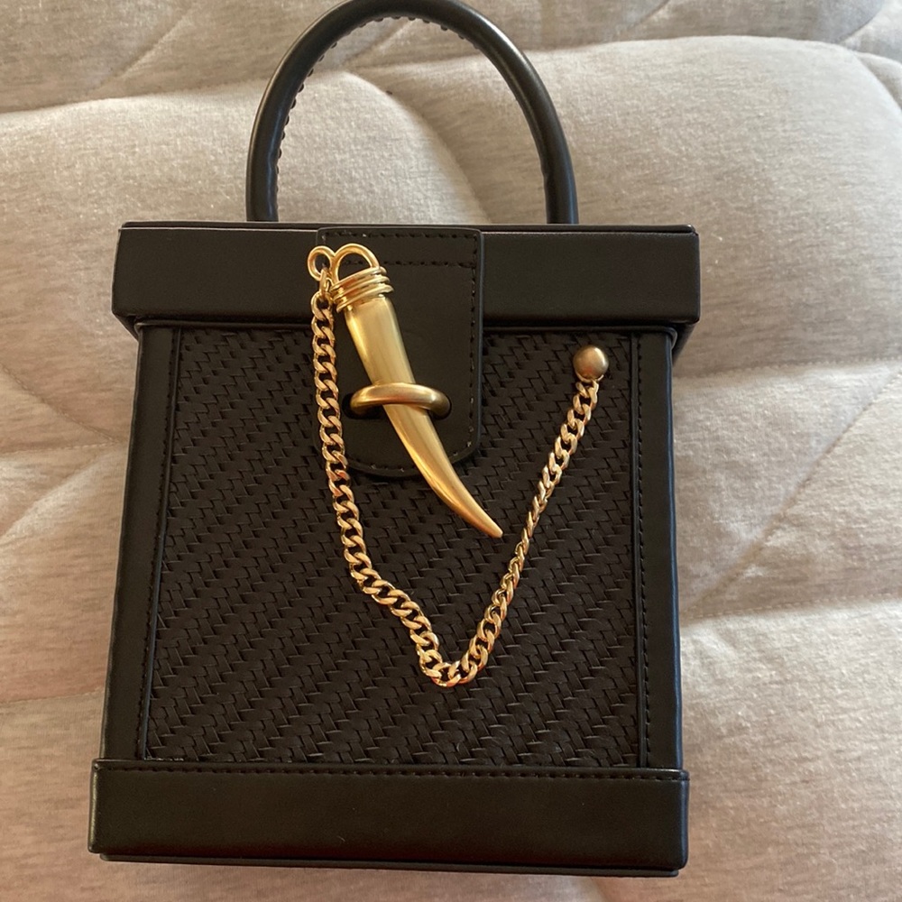Black Sancia purse with detachable strap